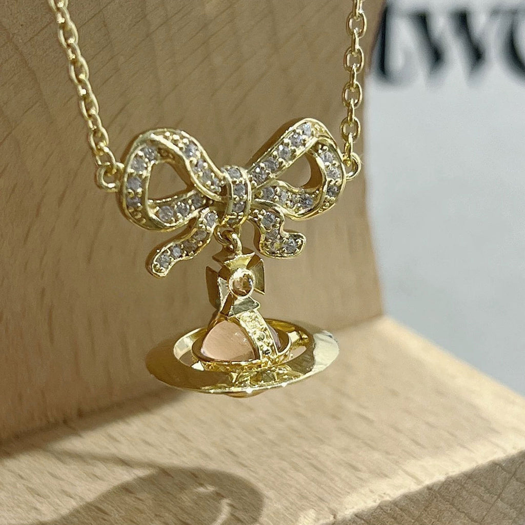 Sweet Luxury Bow Saturn Cat Eye Clavicle Necklace Ladies Daily Pendant Chain